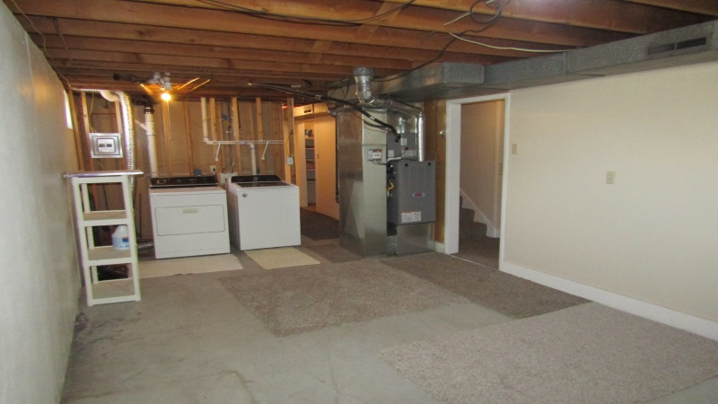 VIEW OF LAUNDRY AND NEW FURNACE LOCATIONS