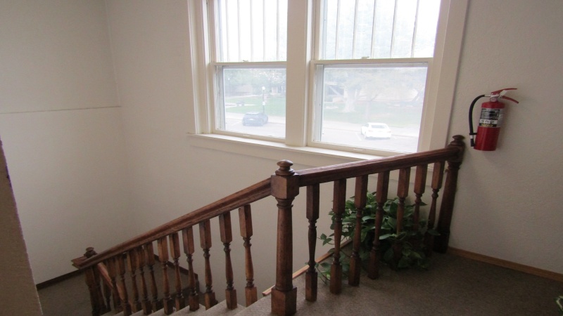 ORIGINAL STAIRCASE GOING FROM TOP LEVEL TO BASEMENT