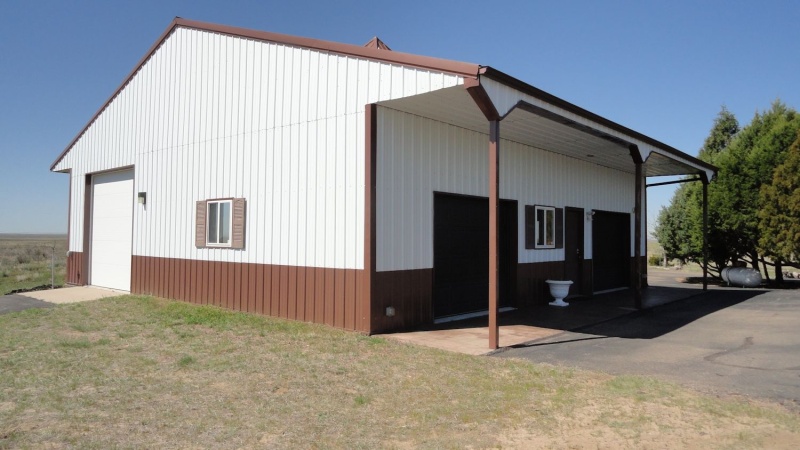 Tall drive thru doors at sides of garage