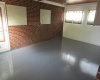 Enclosed porch between house and garage