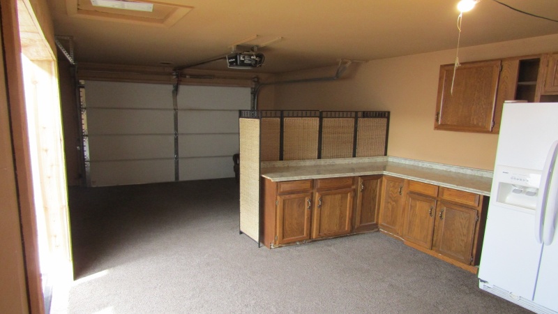 Alley garage interior can be easily converted back to garage