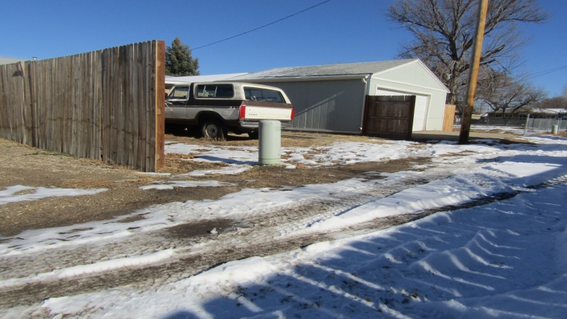 Alley parking beside garage